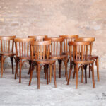 Lot de 8 chaises bistrot baumann en bois, dossier barreaux