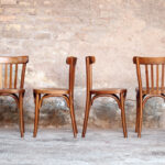 Lot de 8 chaises bistrot baumann en bois, dossier barreaux