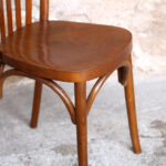 Lot de 8 chaises bistrot baumann en bois, dossier barreaux