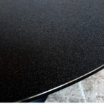Table ronde vintage noir, pied tulipe métal plateau en verre